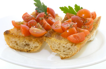 Two bruschetta with tomatoes