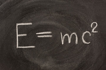 Albert Einstein E=mc2 physical formula on blackboard