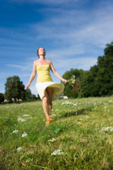 woman walking in field