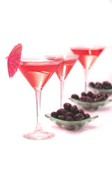 wine glasses with coctail and olives