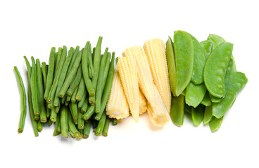 Vegetables on a white background. Pea, corn, haricot