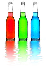 bottles red green and blue with reflection isolated
