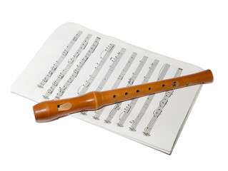 Recorder on a sheet music