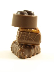 Chocolate candies on isolated background.