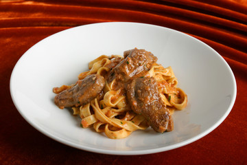 Paste with stewed veal.