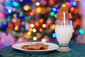 gingerbread man drinking santa claus milk