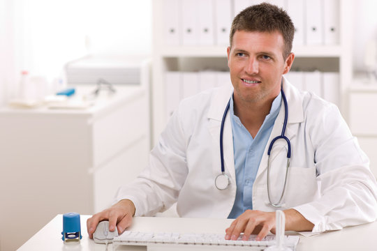 Doctor working at office