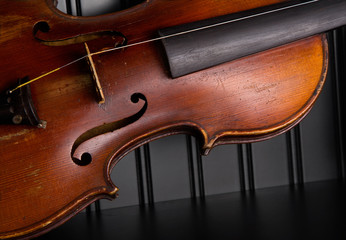 Fototapeta premium Old distressed violin with one string