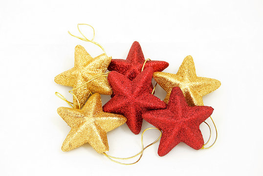 Christmas decoration - star-like ornaments with glitter