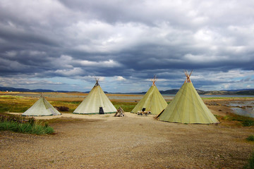 Picturesque autumn landscape with the tepees