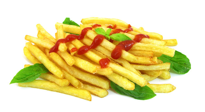 French fries potatoes with tomato ketchup and basil leaves