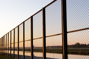 fence on sundown