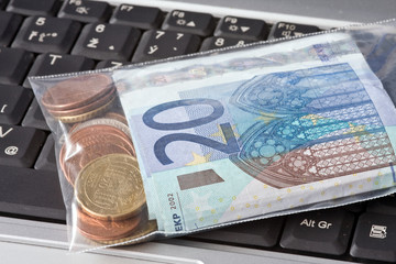 money in plastic bag