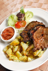 grilled steak with potato chips