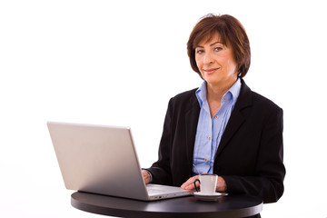 Businesswoman working on laptop
