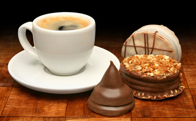 Cup of coffee and sweet chocolates, chocolate series
