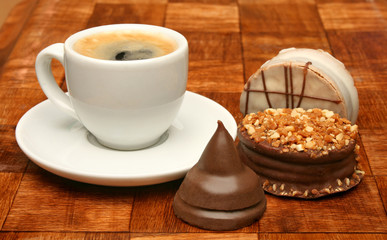 Cup of coffee and sweet chocolates, chocolate series