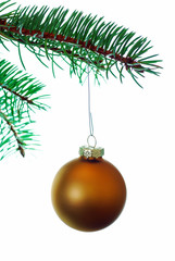 Gold Christmas ball on a branch