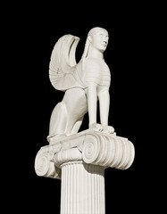 Large ancient Greek sphinx statue fixed on an ionic pillar