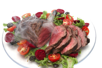 barbecue served with vegetables