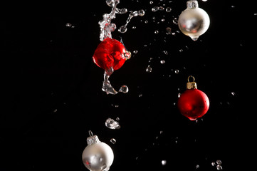 Fototapeta na wymiar Christmas balls on black background