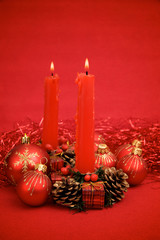 Red christmas balls and candles