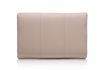 Leather pillow isolated against white background