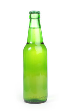 green bottle of beer isolated on a white background