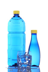 Bottles and glass of mineral water