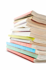 heap of magazines, focus on the top of the heap
