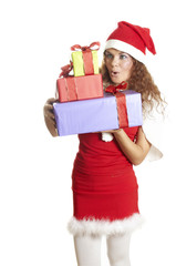 beautiful girl is surprised to a christmas gift