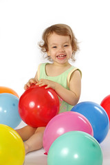 Little girl and balloons.