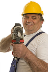 Arbeiter mit Bohrhammer und Schutzhelm