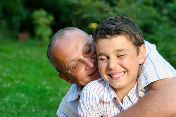 Fototapeta premium Grandfather and grandson having fun