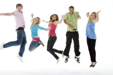 Obraz premium Teenagers Jumping In The Air