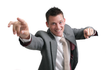 young handsome businessman pointing forward