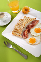 Breakfast - toasts, eggs, bacon