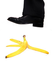 business shoe steping a banana