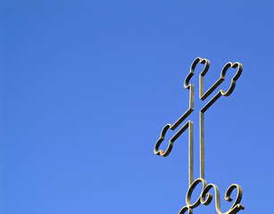iron cross in the blue sky