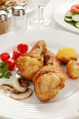 Roasted chicken legs with vegetables