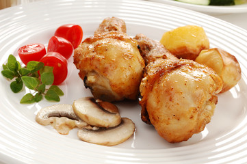 Roasted chicken legs with vegetables