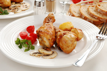 Roasted chicken legs with vegetables