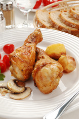 Roasted chicken legs with vegetables