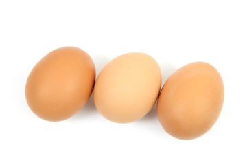 three chicken eggs
