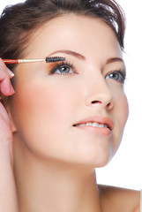 Fototapeta premium applying mascara using lash brush