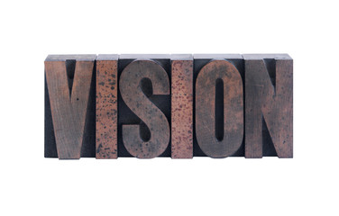 the word 'vision' in old ink-stained wood type