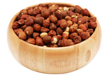 Hazelnuts in wooden dish