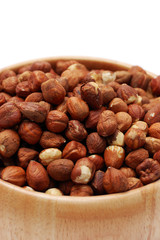 Detail of hazelnuts in wooden dish
