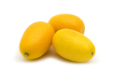 fresh kumquat on white background