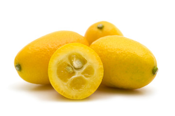fresh kumquat on white background
